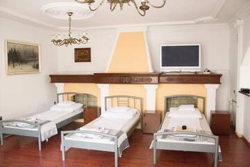 Фото номера Кровать в общем 8-местном номере для мужчин и женщин Хостелы Magic Garden Hostel г. Калиш 8
