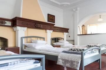Фото номера Кровать в общем 8-местном номере для мужчин и женщин Хостелы Magic Garden Hostel г. Калиш 9