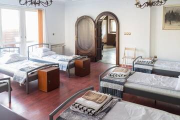 Фото номера Кровать в общем 8-местном номере для мужчин и женщин Хостелы Magic Garden Hostel г. Калиш 10