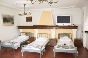 Фото номера Кровать в общем 8-местном номере для мужчин и женщин Хостелы Magic Garden Hostel г. Калиш 5