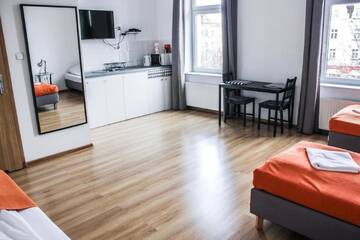 Фото номера Стандартный трехместный номер-студио Апартаменты Apartamenty Babina г. Калиш 3