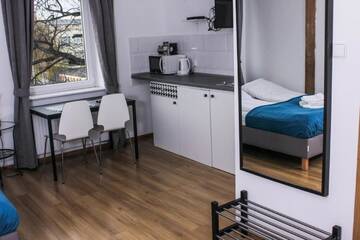 Фото номера Номер-студио с кроватью размера &quot;king-size&quot; Апартаменты Apartamenty Babina г. Калиш 3