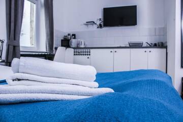 Фото номера Номер-студио с кроватью размера &quot;king-size&quot; Апартаменты Apartamenty Babina г. Калиш 4